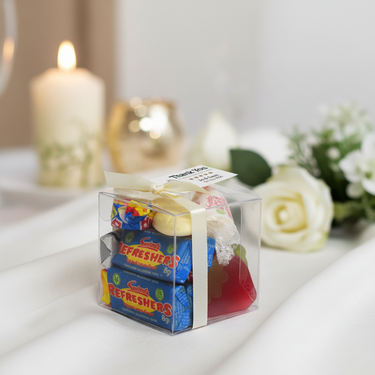 Personalised wedding favour cube with sweets, ribbon and personalised tag