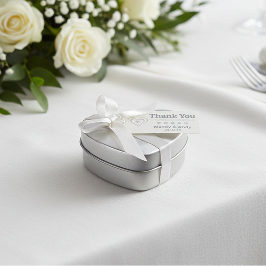 Personalised wedding favour tin with sweets, ribbon and personalised tag