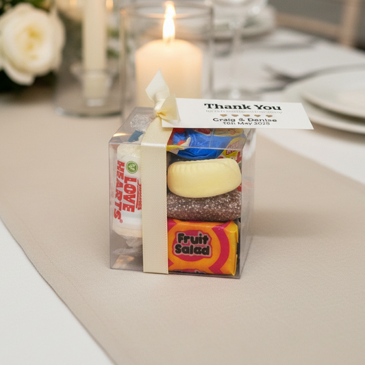 Personalised wedding favour sweets cube with sweets, ribbon and personalised tag