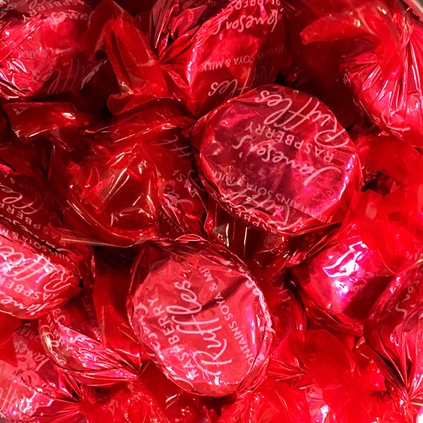 Raspberry & Coconut Ruffles  - Raspberry flavour Coconut Fondant covered in rich Dark Chocolate